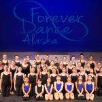 Dancers appear for a photo during a rehearsal of Forever Dances 10th Anniversary Company Showcase, Down Memory Lane, at Kenai Central High School in Kenai, Alaska, on Wednesday, March 26, 2025. (Jake Dye/Peninsula Clarion)