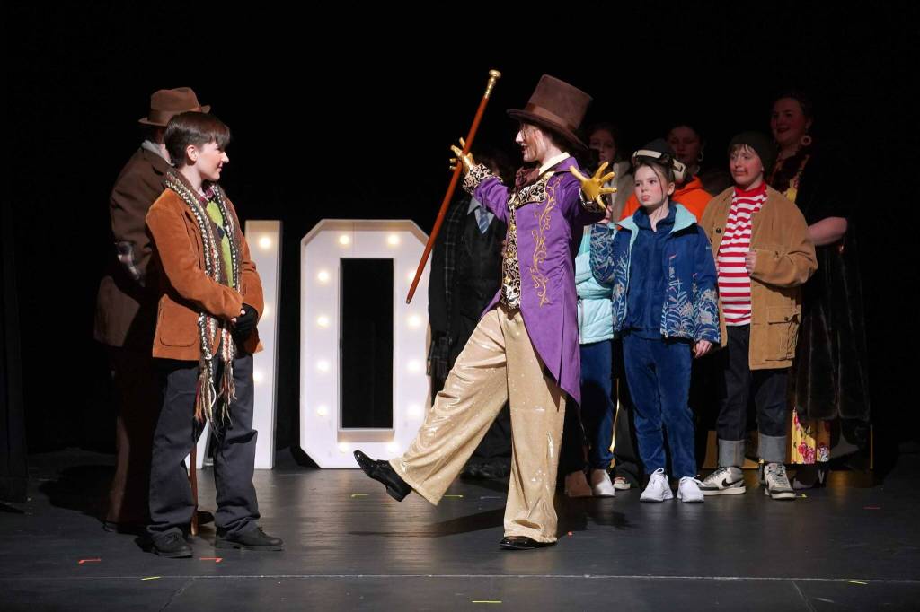 The cast of Seward High School Theatre Collectives Charlie and the Chocolate Factory rehearse on Thursday, April 3, 2025. (Jake Dye/Peninsula Clarion)