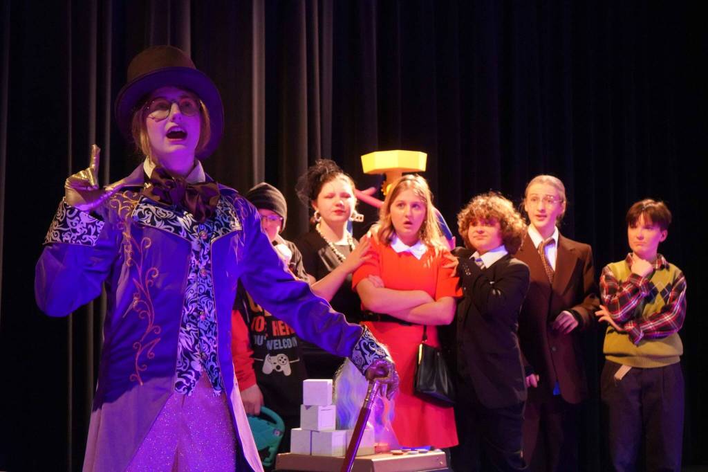The cast of Seward High School Theatre Collectives Charlie and the Chocolate Factory rehearse on Thursday, April 3, 2025. (Jake Dye/Peninsula Clarion)