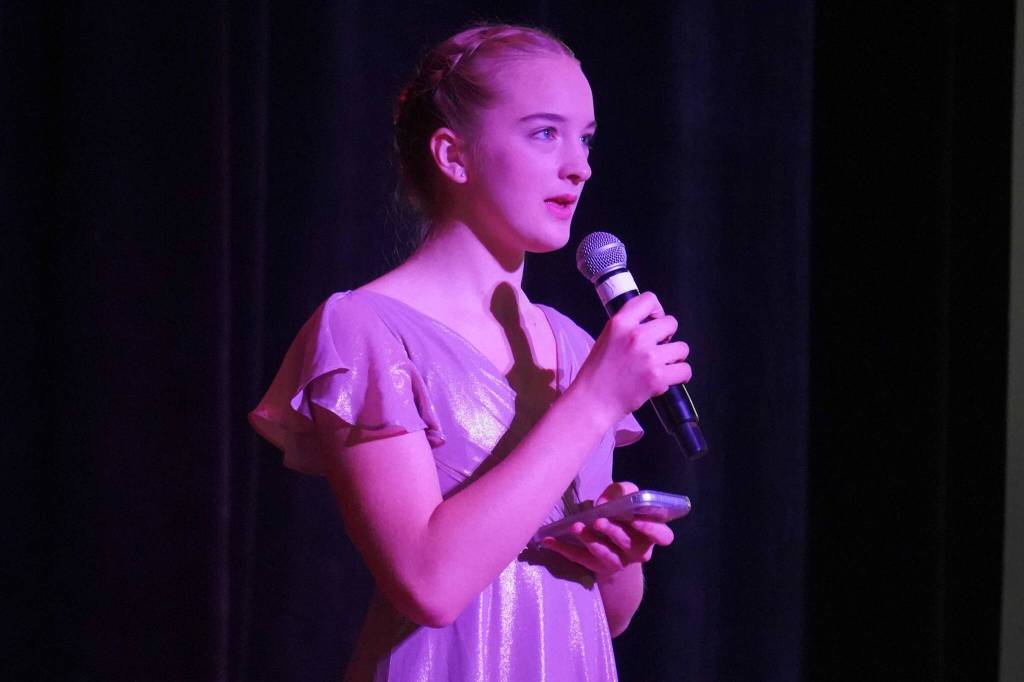 Sariah Henderson performs during the opening of the new Triumvirate Theatre in Kenai, Alaska, on Saturday, April 19, 2025. (Jake Dye/Peninsula Clarion)
