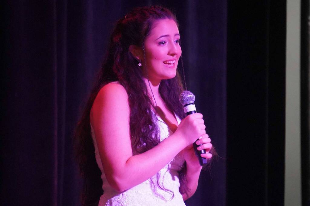 Lucy Micciche performs during the opening of the new Triumvirate Theatre in Kenai, Alaska, on Saturday, April 19, 2025. (Jake Dye/Peninsula Clarion)