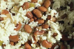 These pinto beans and rice only take about 10 minutes of hands-on work before they are stewed for about 12 hours in a cooking pot. (Photo by Tressa Dale/Peninsula Clarion)