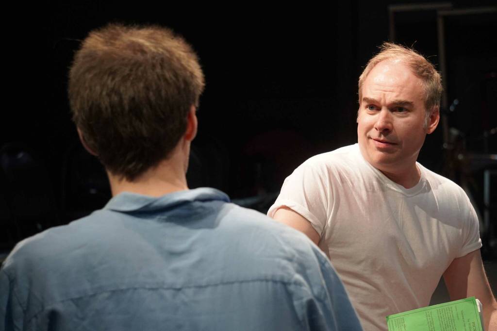 Jamie Nelson, right, and Tony Mika rehearse Picnic at the Kenai Performers Theater near Soldotna, Alaska, on Saturday, April 26, 2025. (Jake Dye/Peninsula Clarion)