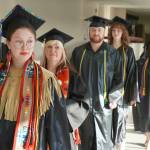 Graduates process into the 55th Annual Kenai Peninsula College Commencement Ceremony, held at Kenai Central High School in Kenai, Alaska, on Thursday, May 8, 2025. (Jake Dye/Peninsula Clarion)
