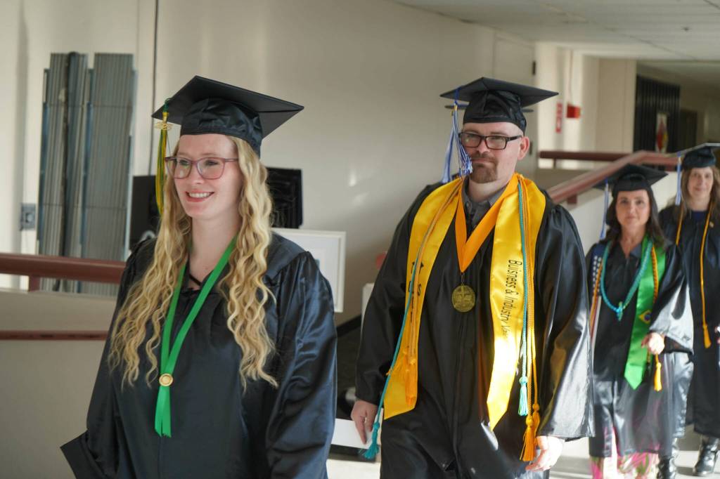 Graduates process into the 55th Annual Kenai Peninsula College Commencement Ceremony, held at Kenai Central High School in Kenai, Alaska, on Thursday, May 8, 2025. (Jake Dye/Peninsula Clarion)