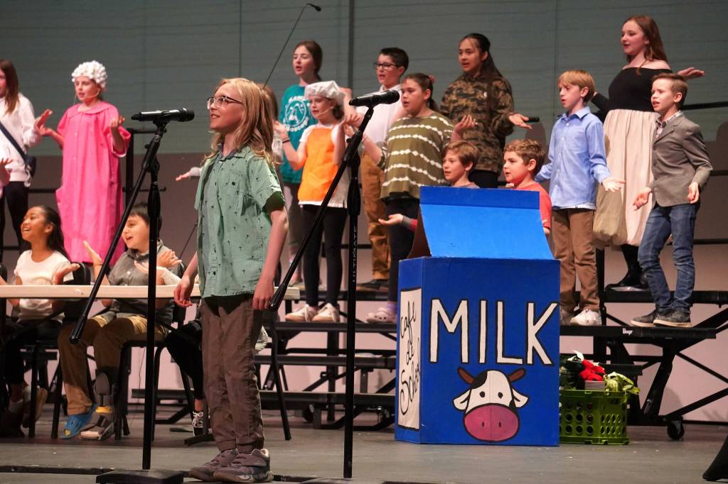 Kaleidoscope School of Arts and Science students perform Lets Eat, their fifth grade musical, at Kenai Central High School in Kenai, Alaska, on Tuesday, May 13, 2025. (Jake Dye/Peninsula Clarion)