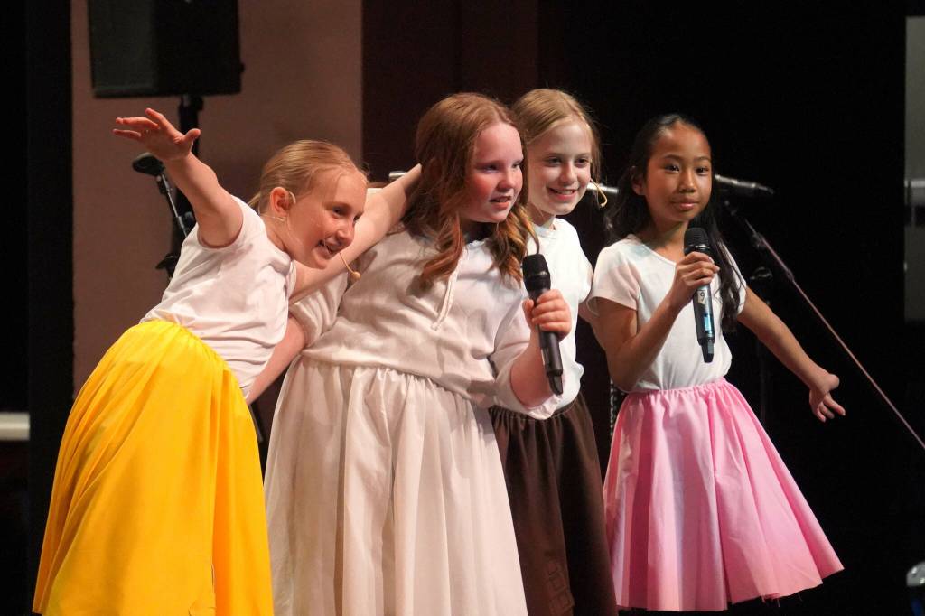 Kaleidoscope School of Arts and Science students perform Lets Eat, their fifth grade musical, at Kenai Central High School in Kenai, Alaska, on Tuesday, May 13, 2025. (Jake Dye/Peninsula Clarion)