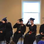 The Voznesenka School graduating class of 2025 moves their tassels following the presentation of their diplomas during the commencement ceremony held Monday, May 19, 2025, at Lands End Resort in Homer, Alaska. (Delcenia Cosman/Homer News)
