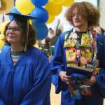 Kenai Alternative High School graduates process out of their commencement ceremony in the schools gym in Kenai, Alaska, on Wednesday, May 22, 2025. (Jake Dye/Peninsula Clarion)
