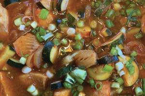 This version of maeuntang, or Korean fishermans stew, features sablefish, daikon, zucchini and green onions with fermented Korean bean and red pepper pastes. (Photo by Tressa Dale/Peninsula Clarion)
