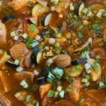 This version of maeuntang, or Korean fishermans stew, features sablefish, daikon, zucchini and green onions with fermented Korean bean and red pepper pastes. (Photo by Tressa Dale/Peninsula Clarion)