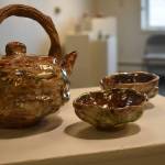 A clay tea set on display at the Kenai Potters Guild Exhibit hosted by the Kenai Art Center. (Jonas Oyoumick/Peninsula Clarion)