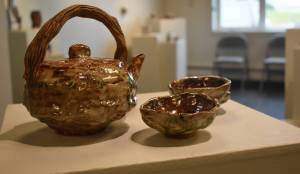 A clay tea set on display at the Kenai Potters Guild exhibit, River, hosted by the Kenai Art Center. (Jonas Oyoumick/Peninsula Clarion)