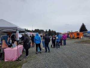 Homer community members line up for delicious offerings from multiple food trucks and booths at the Taste of Homer Food Truck Festival on Saturday, May 10, 2024 at the Baycrest KOA Campground in Homer, Alaska. (Photo by Delcenia Cosman/Homer News)
Homer community members line up for delicious offerings from multiple food trucks and booths at the Taste of Homer Food Truck Festival on Saturday, May 10, 2024 at the Baycrest KOA Campground in Homer, Alaska. (Photo by Delcenia Cosman/Homer News)