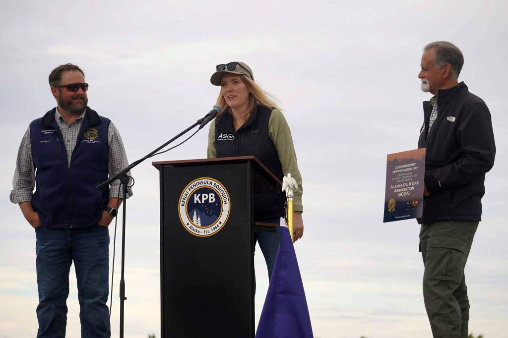 Sierra Minder, of Alaska Oil & Gas Association, speaks after AOGA received the Outstanding Support Organization for Oil and Gas Award during the 2025 Industry Appreciation Day at the Kenai Softball Greenstrip in Kenai, Alaska, on Saturday, Aug. 23, 2025. (Jake Dye/Peninsula Clarion)