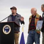 Jacob Caldwell, CEO of Kenai Aviation, speaks after receiving the Outstanding Business in Tourism Award during the 2025 Industry Appreciation Day at the Kenai Softball Greenstrip in Kenai, Alaska, on Saturday, Aug. 23, 2025. (Jake Dye/Peninsula Clarion)