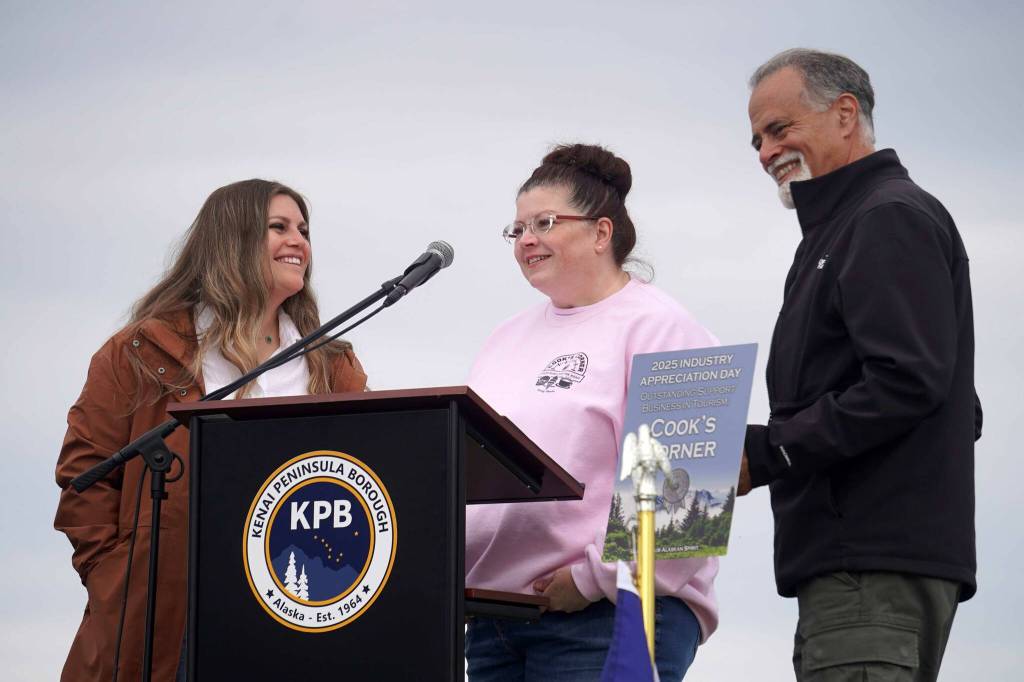 Jennifer Scheller, manager of Cooks Corner, speaks after receiving the Outstanding Support Business in Tourism Award during the 2025 Industry Appreciation Day at the Kenai Softball Greenstrip in Kenai, Alaska, on Saturday, Aug. 23, 2025. (Jake Dye/Peninsula Clarion)