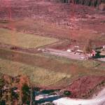 This 1955 aerial shows a portion of Joe and Mickey Faas homestead, including the Quonset hut that was on the property before it was acquired by Howard and Maxine Lee in 1948. The fields and other cleared land now house much of Soldotnas growing medical establishment. (Photo courtesy of Al Hershberger)