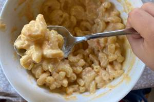 This healthier version of the kid-approved classic is made with pureed sweet potato that makes the dish a vibrant orange, and nutritional yeast imparts a savory, cheesy flavor. (Photo by Tressa Dale/Peninsula Clarion.)