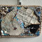 A mixed media piece currently on display through September in the Homer Public Librarys Fireplace Lounge is one of numerous works of art created by members of the Independent Living Centers Artability program in Homer, Alaska. Photo by Christina Whiting