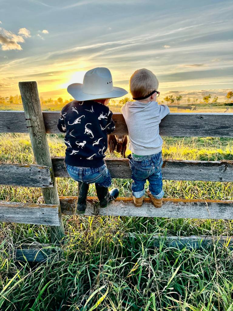 Little Farmers is a photograph by Christina Whiting, taken in Canada in 2023 and on display through September 2025 in her solo exhibit showcasing images from a 5-year documentary project at Fireweed Gallery in Homer, Alaska. Photo provided by Christina Whiting