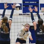 Homers Swift Blackstock attacks against Soldotnas Ashlyn Hall and Teagen Kobylarz on Tuesday, Sept. 9, 2025, at Soldotna High School in Soldotna, Alaska. (Photo by Jeff Helminiak/Peninsula Clarion)