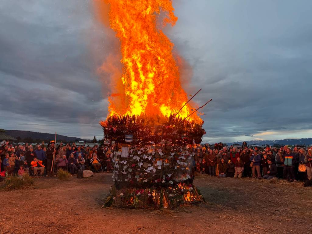 The basket catches fire on Sunday, Sept. 7, 2025, at Mariner Park in Homer, Alaska. (Chloe Pleznac/Homer News)