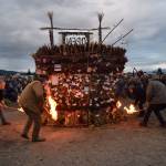 Torch bearers ignite the basket on Sunday, Sept. 7, 2025, at Mariner Park in Homer, Alaska. (Chloe Pleznac/Homer News)