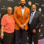 Renee Boozer, Carlos Boozer Jr. and Carlos Boozer Sr. attend the enshrinement ceremony at the Naismith Basketball Hall of Fame in Springfield, Massachusetts, on Saturday, Sept. 6, 2025. As a member of the 2008 U.S. mens Olympic team, Boozer Jr. is a member of the 2025 class. (Photo provided by Carlos Boozer Sr.)