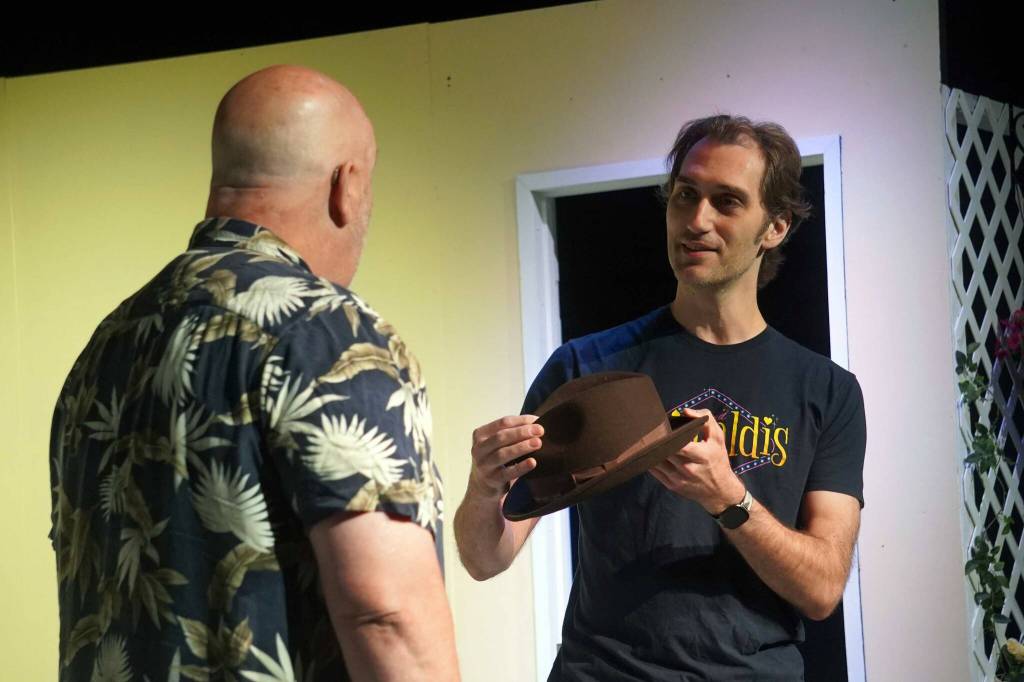 Sean Morgan and Tony Mika rehearse If Men Played Cards as Women Do at the Kenai Performers Theater near Soldotna, Alaska, on Saturday, Sept. 13, 2025. (Jake Dye/Peninsula Clarion)