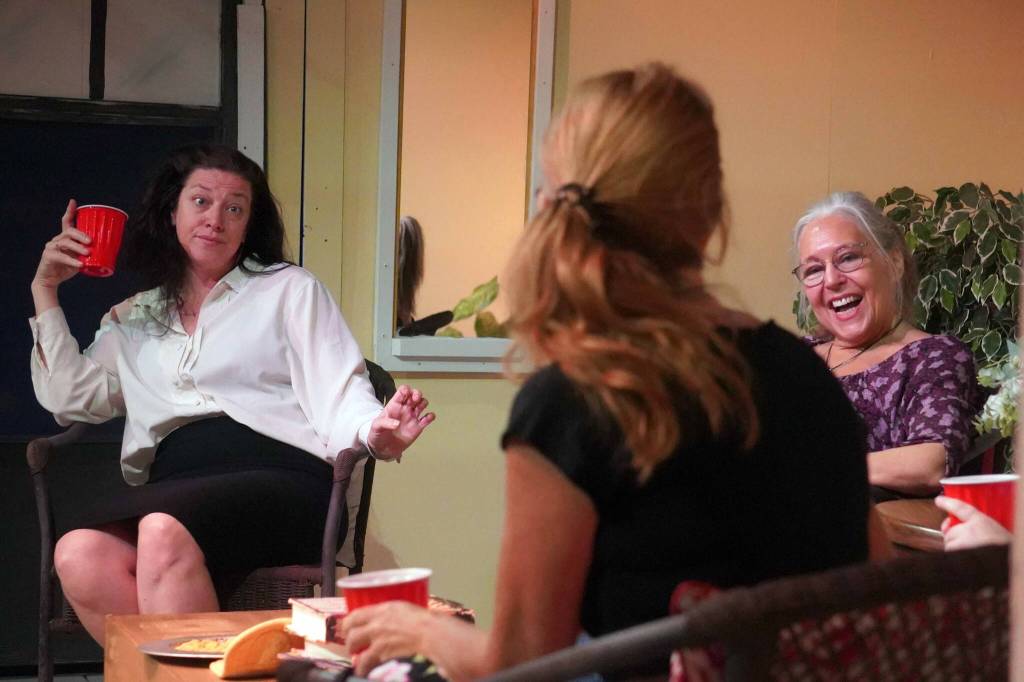 Amy Burton, Tracie Sanborn and Yvette Tappana rehearse Savannah Sipping Society at the Kenai Performers Theater near Soldotna, Alaska, on Saturday, Sept. 13, 2025. (Jake Dye/Peninsula Clarion)