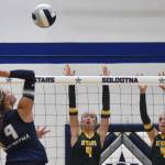 Soldotnas Gracelyn Altobelli attacks against Sewards Kirra DesErmia and Makena DesErmia on Thursday, Sept. 18, 2025, at Soldotna High School in Soldotna, Alaska. (Photo by Jeff Helminiak/Peninsula Clarion)