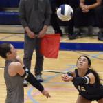 Soldotnas Grayson Henry and Samantha Piscoya dig up a ball against Seward on Thursday, Sept. 18, 2025, at Soldotna High School in Soldotna, Alaska. (Photo by Jeff Helminiak/Peninsula Clarion)