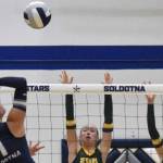 Soldotna's Gracelyn Altobelli attacks against Seward's Kirra DesErmia and Makena DesErmia on Thursday, Sept. 18, 2025, at Soldotna High School in Soldotna, Alaska. (Photo by Jeff Helminiak/Peninsula Clarion)