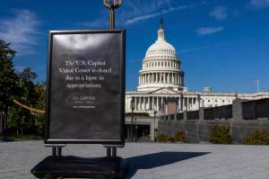 Signage outside the Capitol Hill visitors center notifies the public of its closure due to the government shutdown in Washington, on Wednesday, Oct. 1, 2025. The first government shutdown in nearly six years left federal agencies in flux and many of their employees in a state of confusion on Wednesday, Oct. 1, 2025, as they received last-minute and conflicting instructions from managers. (Alex Kent/The New York Times)