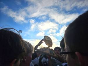 The Homer Mariners varsity football team celebrates their victory after the Division III state championships game on Saturday, Oct. 18, 2025, in Wasilla, Alaska. Photo provided by Justin Zank