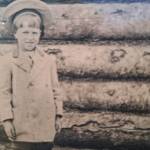 Emmett Krefting, age 6-7, at the Wible mining camping in 1907-07, about the time he first met King David Thurman. (Photo from the cover of Krefting’s memoir, Alaska’s Sourdough Kid)