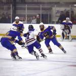 Photo courtesy Christopher Kincaid/RCKincaidPhoto
A Kodiak hockey player grabs the back of a Homer players jersey during the End of the Road Shootout, held Nov. 20-22 at Kevin Bell Arena.