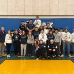 The varsity wrestling team is pictured after the Robin Hervey individual tournament in Kodiak on Nov. 22, 2025. Photo courtesy of Pete Dickinson