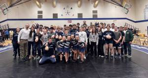 Photo courtesy Pete Dickinson
The SoHi junior varsity and varsity wrestling teams compete in the Battle for the Bird at Soldotna High School on Wednesday, Nov. 26. The Kenai Peninsula Athletics Sapphire dance team performed the halftime show.