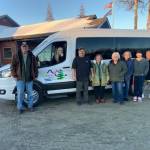 Staff at Soldotna Senior Citizens, Inc. are photographed on Dec. 17<ins>, 2025,</ins> in Soldotna<ins>, Alaska,</ins> in front of a new 15-passenger van purchased with funds the Rasmuson Foundation and several local businesses donated to the nonprofit organization. Photo courtesy of Soldotna Senior Citizens, Inc.
