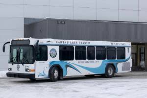 A Kahtnu Area Transit bus leaves the Transit Center building located at the corner of the Kenai Spur Highway and Marathon Road in Kenai, Alaska. The new service connects Nikiski, Kenai, Soldotna and Sterling. Photo courtesy Kahtnu Area Transit.