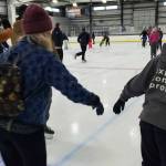 Community members enjoy skating at Kevin Bell Arena during the Christmas Eve community free skate on Wednesday, Dec. 24, 2025, in Homer, Alaska. (Delcenia Cosman/Homer News)