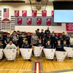 The Soldotna High School wrestling team is pictured after the Northern Lights regional conference in Wasilla, Alaska, on Saturday, Dec. 13, 2025. SoHi sent 33 boys and 11 girls to regionals. 22 boys and nine girls will compete in the state tournament at the Alaska Airlines Center this weekend. Photo courtesy of Soldotna High School Athletics