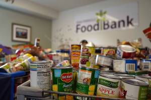 Carts filled with food collected during the Freedom from Hunger community food drive are displayed at the Kenai Peninsula Food Bank near Soldotna, Alaska, on Friday, Sept. 19, 2025. (Jake Dye/Peninsula Clarion)