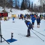 Freshman Freya Bartlett crosses the finish line in the 7.5-kilometer classic to take second in Division II during the Region III Nordic ski championships held Feb. 6-7 at Government Peak in Palmer, Alaska. Photo courtesy Jessie Goodrich