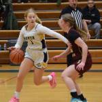 Sophomore Emily Stafford gets around an opponent during the varsity game against Grace Christian on Saturday, Feb. 7, 2026, during the annual Winter Carnival basketball tournament in the Alice Witte Gymnasium at Homer High School in Homer, Alaska. (Delcenia Cosman/Homer News)